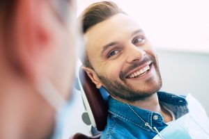 man happy with dental care